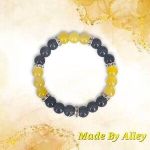 Handmade Yellow and Black 8mm Glass Beaded Bracelet with Silver Spacers